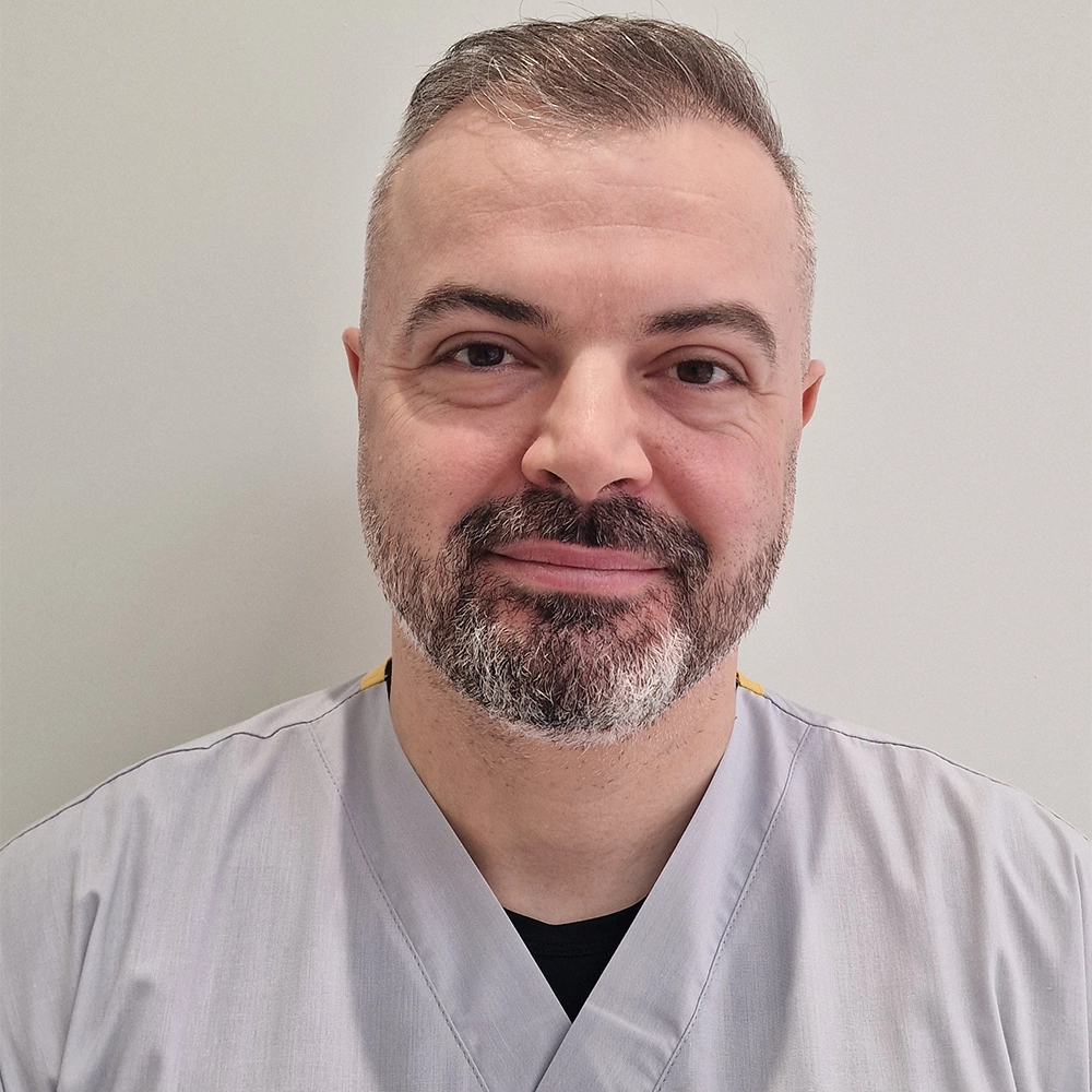 Dr. Erald Rusi
